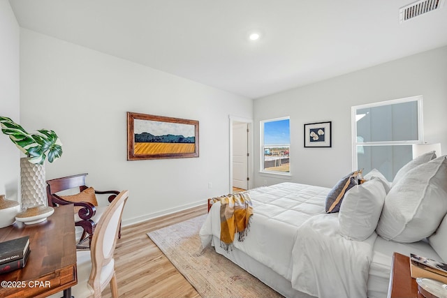 bedroom featuring light wood-type flooring