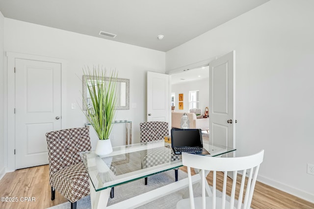 dining area featuring light hardwood / wood-style floors