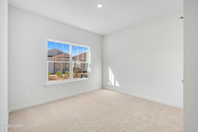 view of carpeted spare room