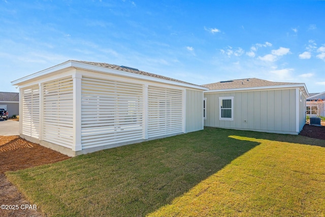 garage featuring a lawn