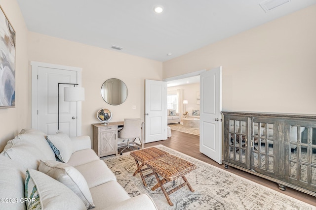 living room with hardwood / wood-style flooring