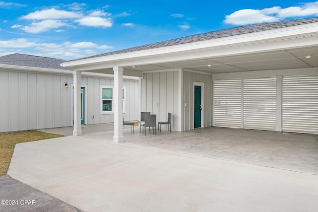 view of patio / terrace featuring a carport