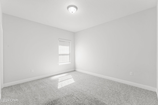 empty room with carpet floors