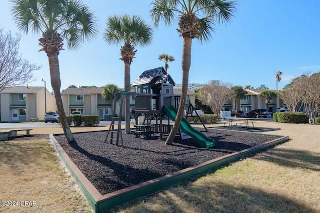 view of jungle gym featuring a yard