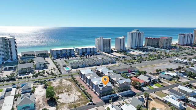 aerial view featuring a beach view and a water view