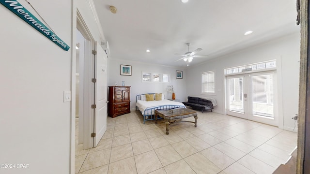 bedroom featuring ceiling fan, access to exterior, light tile patterned floors, crown molding, and french doors