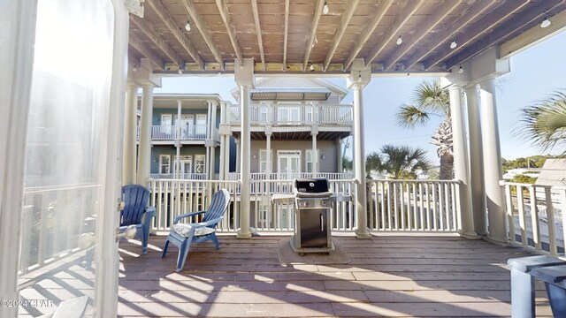 wooden terrace with grilling area