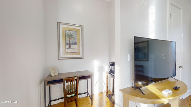 office area with light wood-type flooring