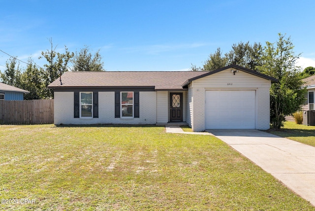 ranch-style home featuring a front yard and a garage