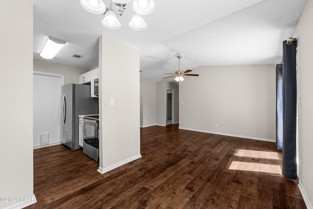 unfurnished living room featuring ceiling fan with notable chandelier, lofted ceiling, dark hardwood / wood-style flooring, and a textured ceiling