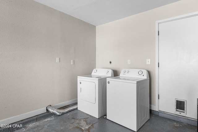 laundry room with washer and clothes dryer