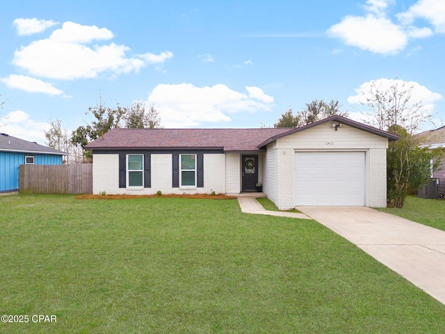 single story home with a front yard and a garage