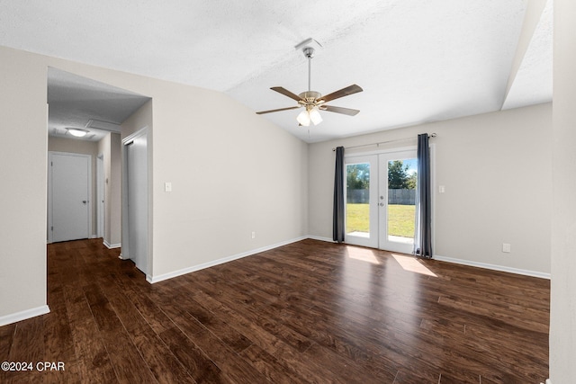 unfurnished room featuring french doors, vaulted ceiling, dark wood-type flooring, and ceiling fan