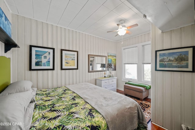 bedroom featuring hardwood / wood-style floors and ceiling fan