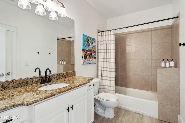 full bathroom with hardwood / wood-style flooring, vanity, shower / bathtub combination with curtain, and toilet