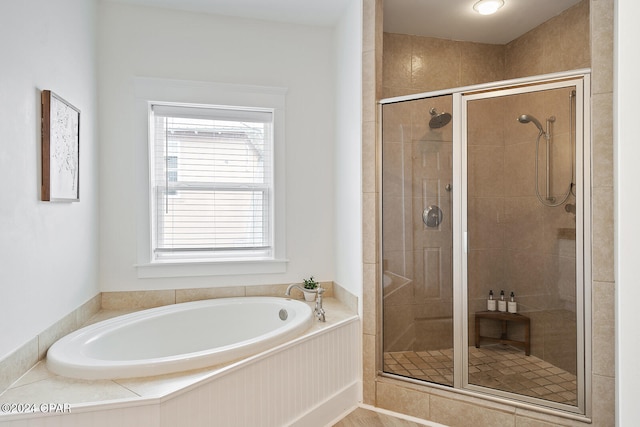 bathroom with independent shower and bath