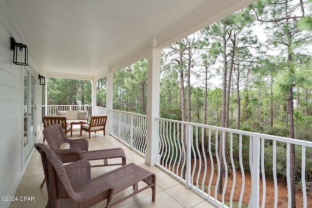 balcony featuring a porch