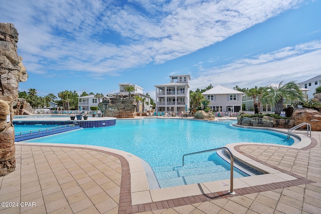 view of pool featuring a patio