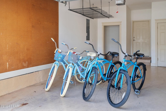 garage featuring a garage door opener and electric panel