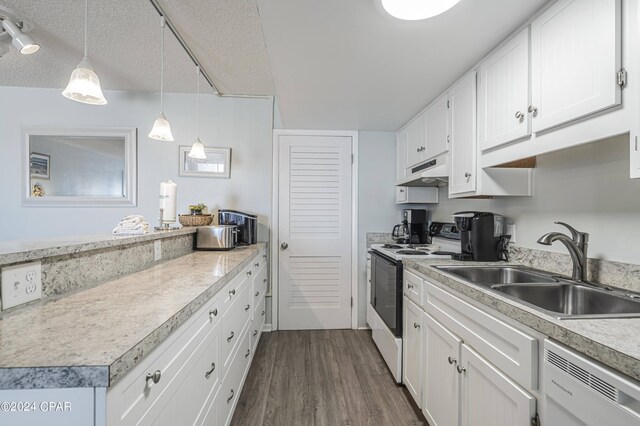 kitchen with electric range, dishwasher, hanging light fixtures, a textured ceiling, and white cabinets