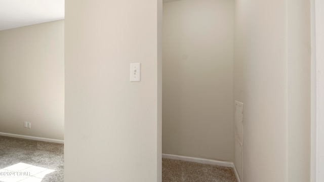 interior space featuring light colored carpet