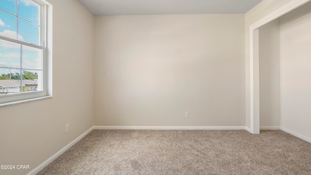 view of carpeted spare room