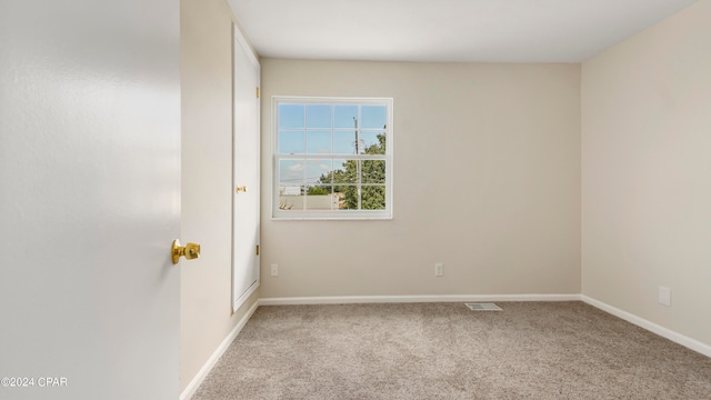 view of carpeted spare room