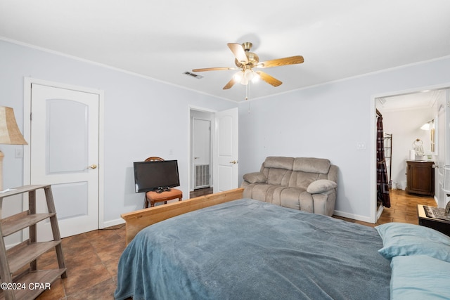 bedroom featuring baseboards, crown molding, visible vents, and a ceiling fan