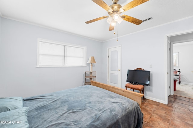 bedroom with crown molding, baseboards, and ceiling fan
