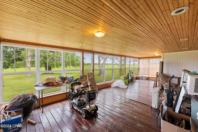 sunroom / solarium featuring wooden ceiling