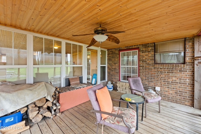 wooden deck with ceiling fan