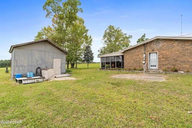 view of yard with a sunroom