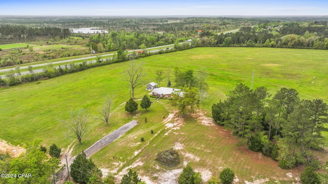 birds eye view of property featuring a rural view