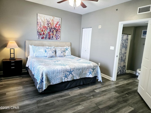 bedroom with dark hardwood / wood-style floors and ceiling fan