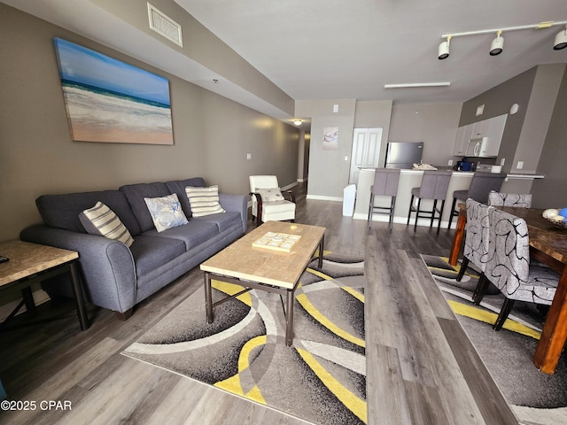 living room with hardwood / wood-style floors