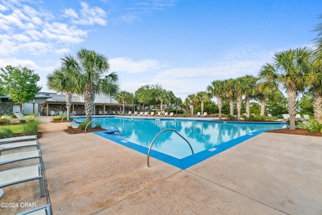 pool featuring a patio area