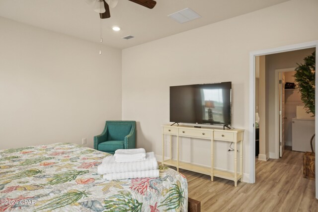 kitchen featuring ceiling fan, light hardwood / wood-style flooring, white cabinets, and appliances with stainless steel finishes