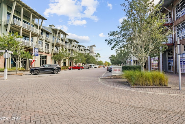 view of road featuring curbs and sidewalks