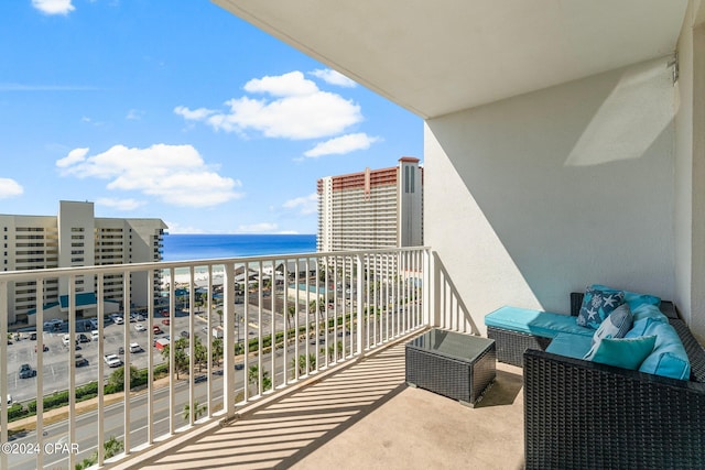 balcony featuring a water view