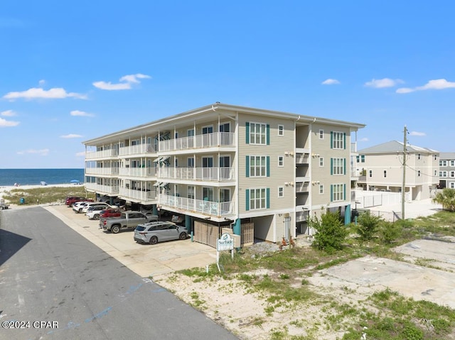 view of building exterior with a water view