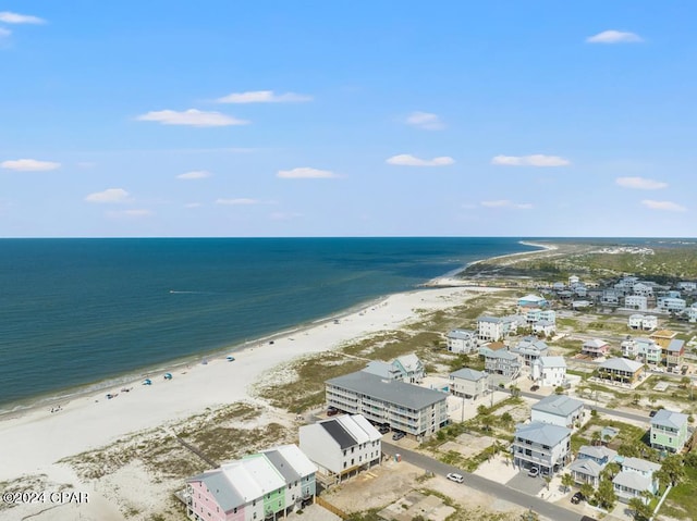 aerial view featuring a water view and a beach view