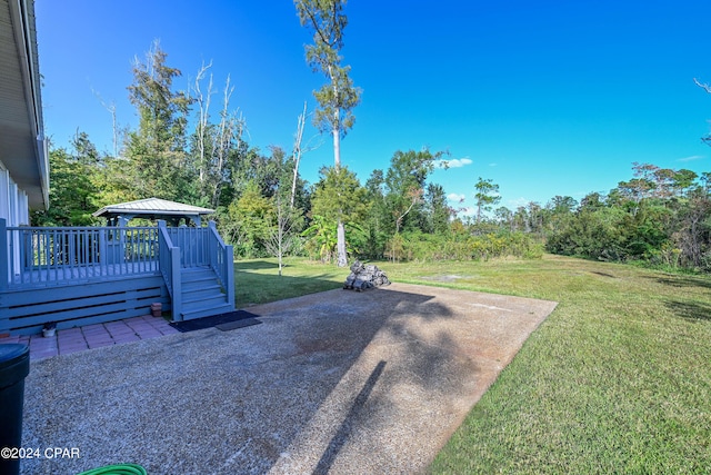 4526 Brook Forest Dr, Panama City, FL 32404 - view of yard with a gazebo, a patio, and a wooden deck
