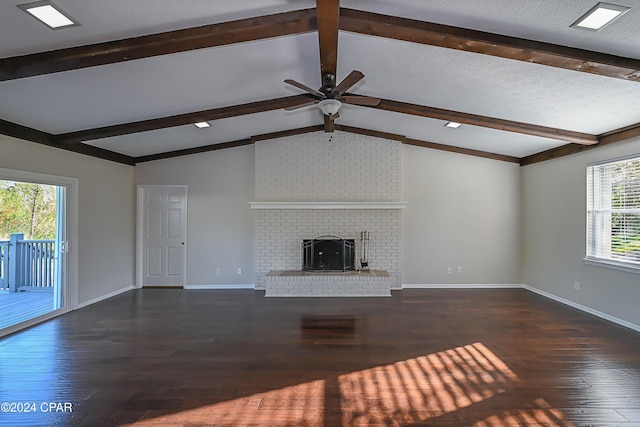 4526 Brook Forest Dr, Panama City, FL 32404 - unfurnished living room with lofted ceiling with beams, a brick fireplace, ceiling fan, baseboards, and wood finished floors