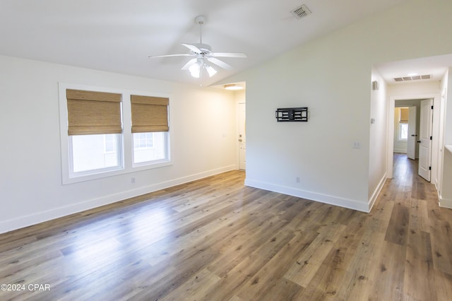 spare room with ceiling fan and wood-type flooring