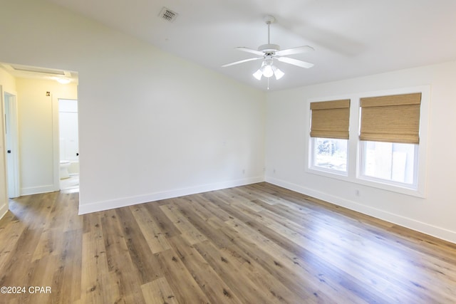 unfurnished room featuring hardwood / wood-style floors and ceiling fan