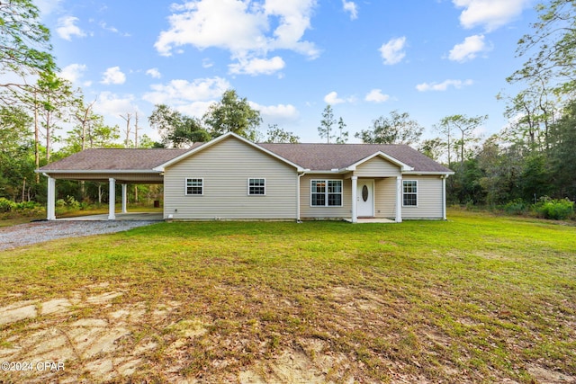 ranch-style house with a front lawn