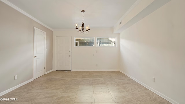 unfurnished dining area with crown molding and an inviting chandelier