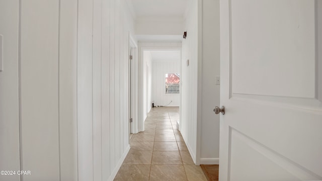 hallway featuring light tile patterned floors