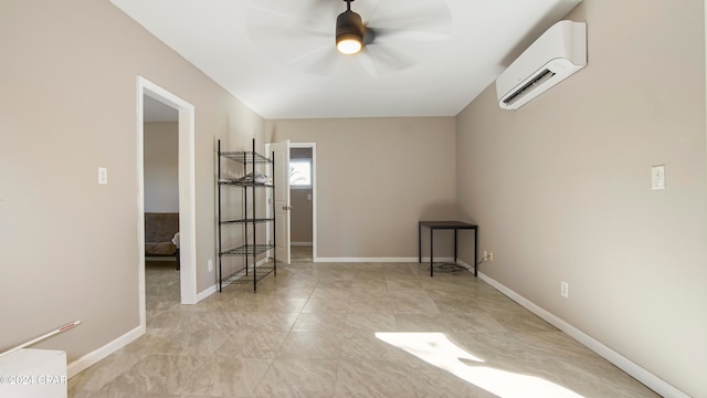 empty room featuring a wall mounted air conditioner and ceiling fan