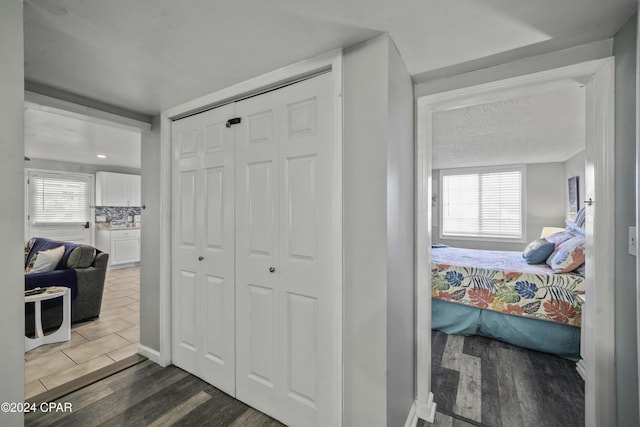 202 3rd St, Mexico Beach, FL 32456 - corridor with plenty of natural light and dark wood-type flooring